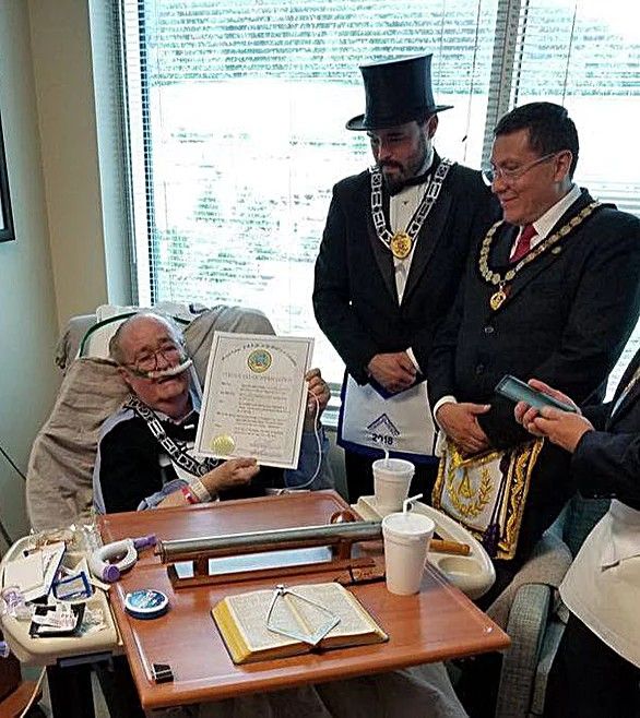 Lodge members visiting a local hospital with gifts