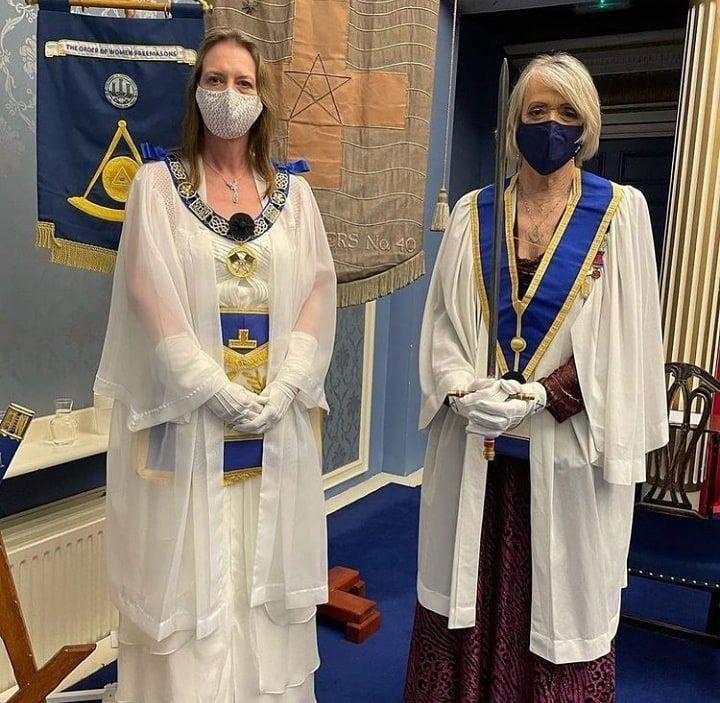 Women Freemasons gathered for a lodge photograph